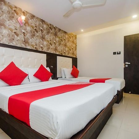 Oyo 6719 Atlas Grand Hotel Мумбай Екстериор снимка